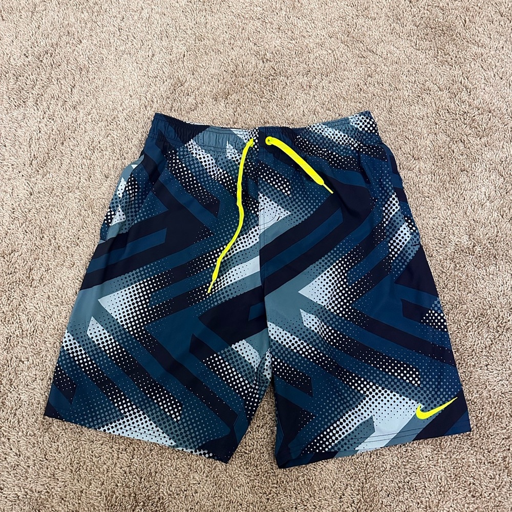 Men’s blue lined Nike swim trunks